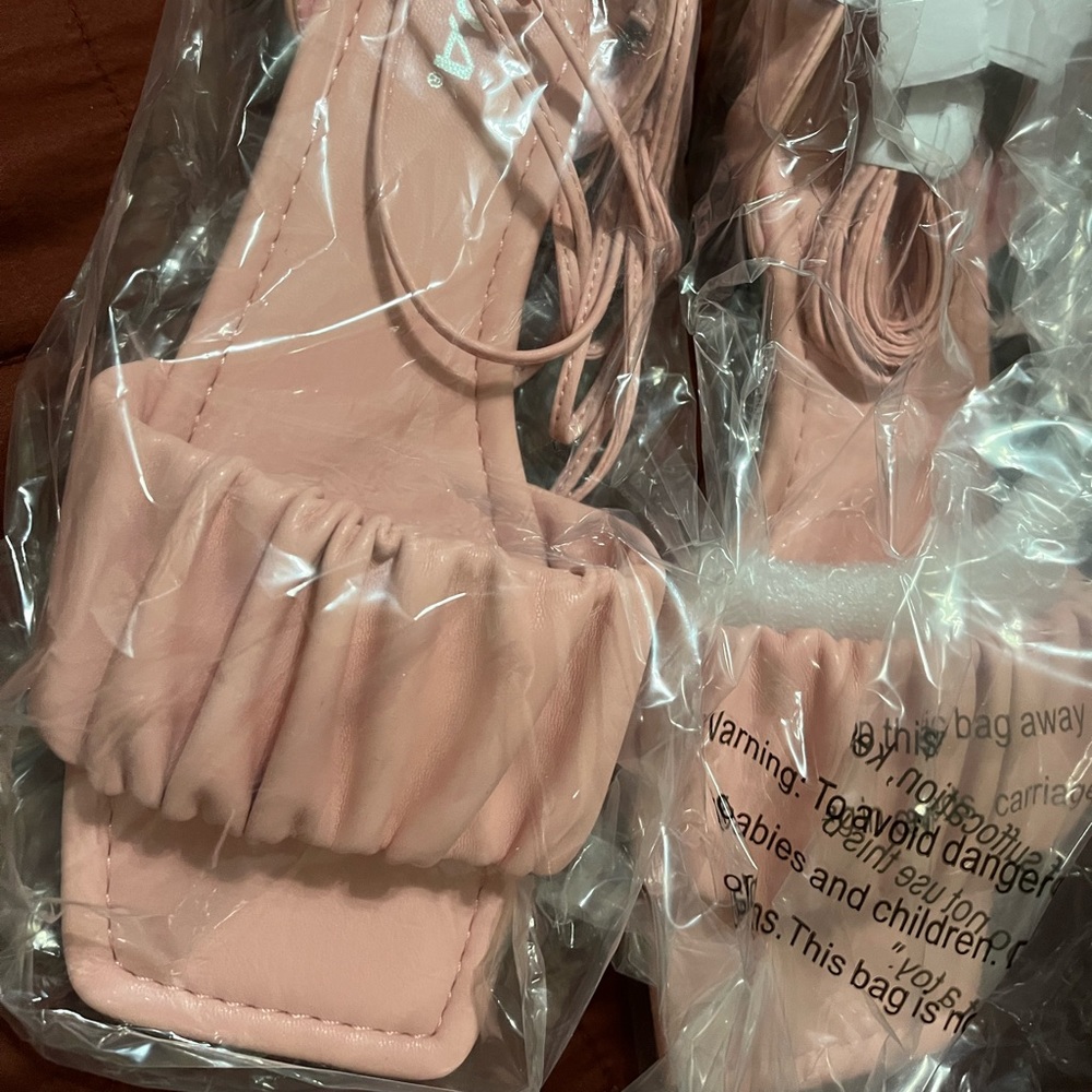 Cute stylish wrap around sandals in a light pink /blush color